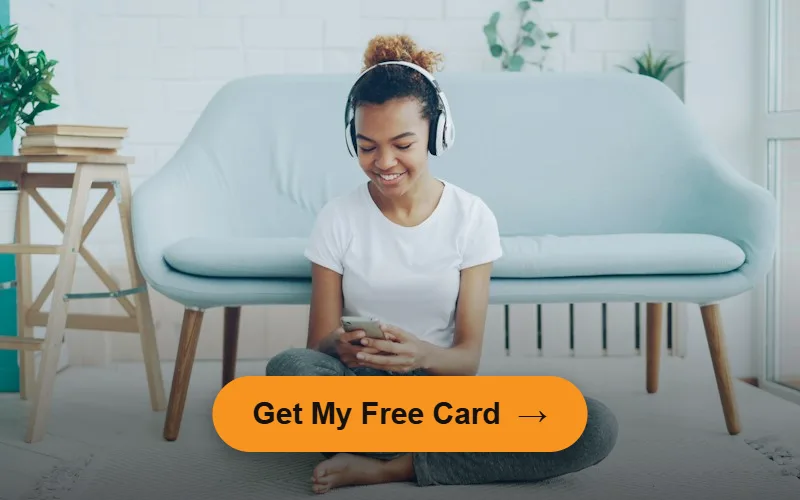 Woman smiling at her phone at home - get your free prescription card